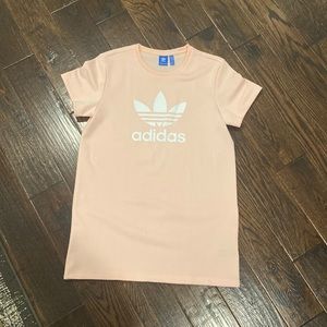 Light pink Adidas Women’s shirt dress size medium. Never worn.
